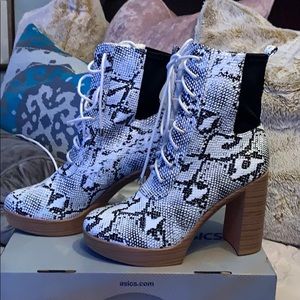Snakeskin heeled boots